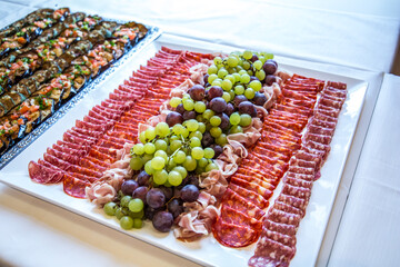 fruit salad and prosciutto