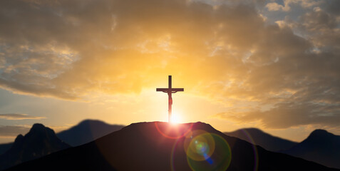 Silhouette of Jesus with Cross over calvary sunset,holy cross symbolizing the suffering,death and resurrection of Jesus Christ.concept for religion,worship,Good Friday,Easter,Jesus he is risen