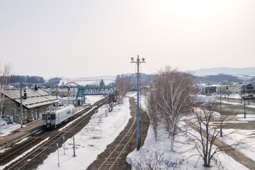 Fototapeta na wymiar 北海道の美瑛駅と列車