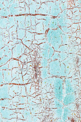 Rusty metal abstract background. Texture of an old blue grunge metal plate with cracked paint.
