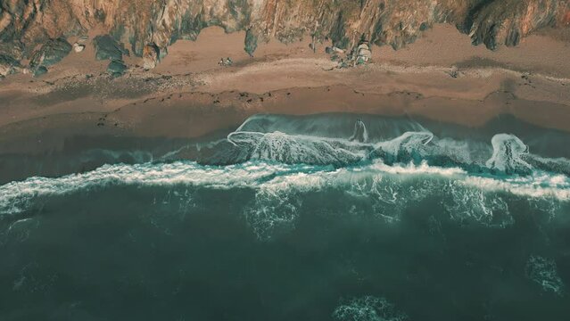 Ocean waves crashing on wild coastline in South Devon, England
