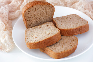 Slices of gluten free bread on a white plate