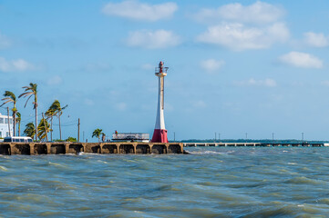 A view along the coast from the port of Belize City, Belize from the sea on a sunny day