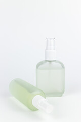 Cosmetic bottle on a white background. Shallow depth of field.