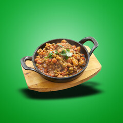 Floating Vegetable baked in little pan on green