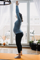 Fototapeta na wymiar Benefits of prenatal yoga for pregnant women, including stress relief and improved flexibility. prenatal yoga for third trimester at home. Poses for Strength and Soothing Every Trimester.