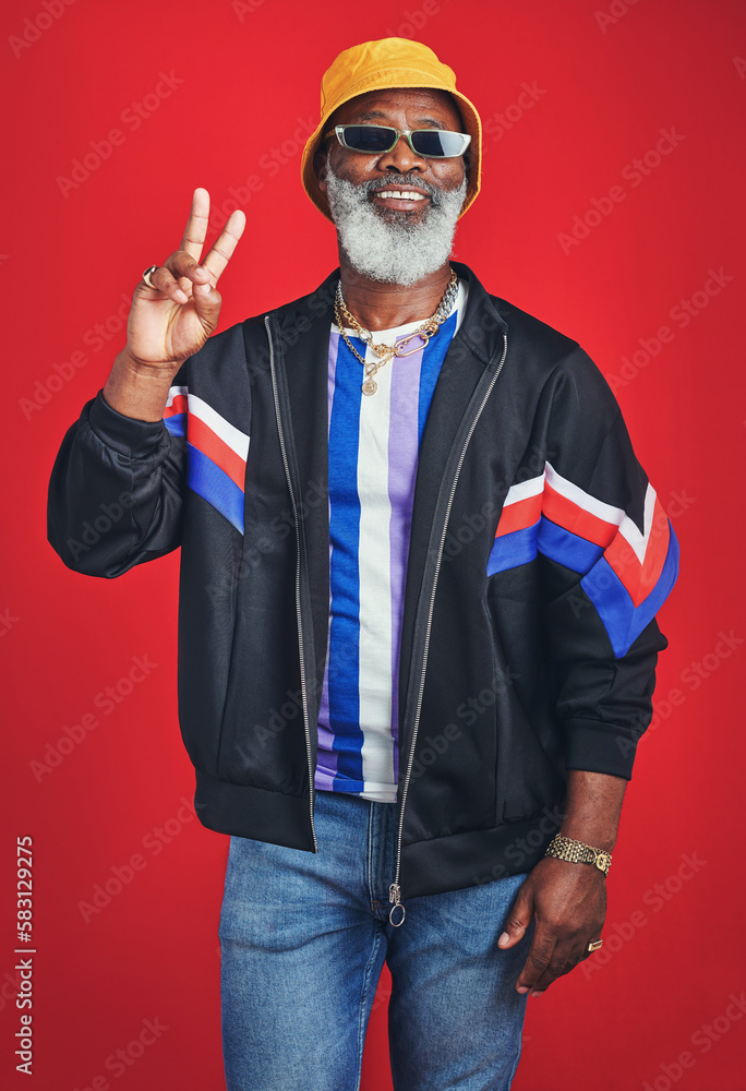 Poster this is what you call swag. studio shot of a senior man wearing retro attire while posing against a 