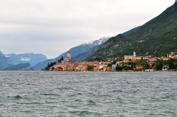 View of Lake Garda and Town of Malcesine with Distant Mountains 