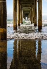 Reflections Under Scripps Memorial Pier on La Jolla Shores Beach, La Jolla, California, USA