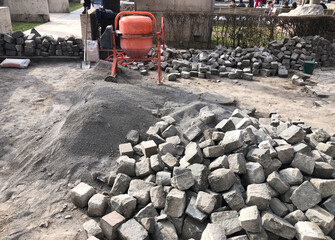 Laying paving stones, road works to repair the pavement