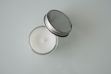 Scented candle in glass with white background                              