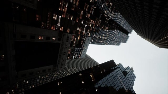 vertical format of looking directly up at the skyline of the financial district