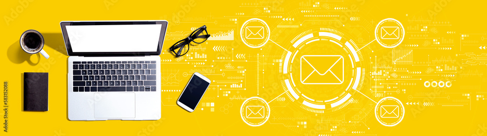 Poster email concept with a laptop computer on a desk