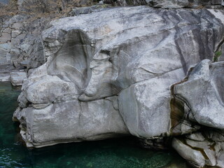 The crystalline and emerald waters in the canyons of the Verzasca river. Lavertezzo, Switzerland.