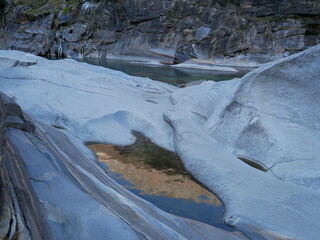 The crystalline and emerald waters in the canyons of the Verzasca river. Lavertezzo, Switzerland.