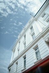 Vertical low angle shot of a white building exterior in Hamburg, Germany