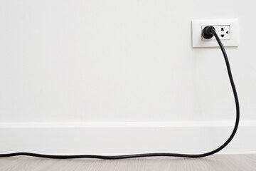 Close Up the electrical power socket and plug socket on wall.