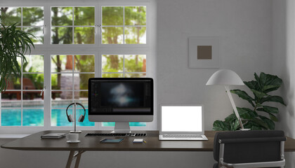 Working table with computer, laptop, mobile phone in home office working room. 3D rendering.