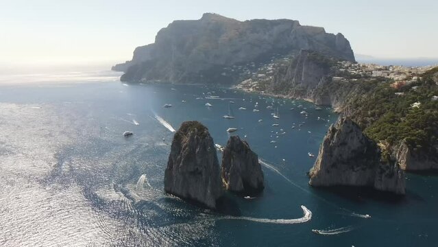Aerial video of Fraglioni off the coast of Capri, Italy