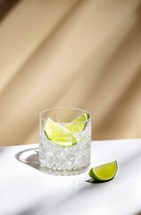 Ti punch alcoholic cocktail drink with white rum agricole, sugar syrup and lime, traditional...