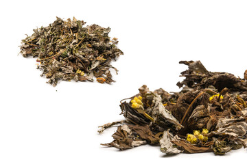 Dry tea leaves and dry fruit isolated on white background.