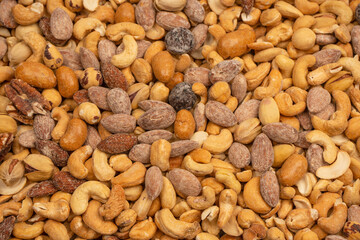 A group of almonds, pistachios, walnuts, macadamia, cashews.