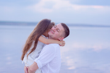 Happy father spending fun time with his little daughter at the beach. father's day