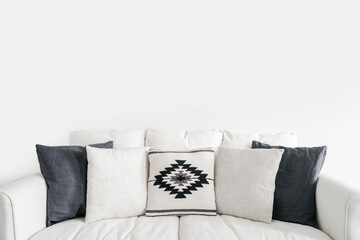 couch with decorative pillows in boho style