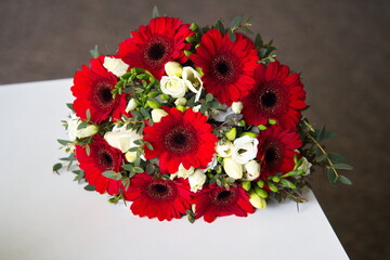 bouquet of red and white roses. wedding bouquet for the bride