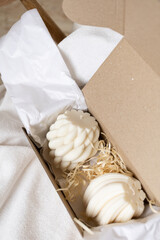 Wax candles packed in a box for shipment