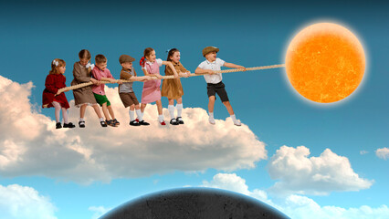 Happy playful little kids, boys and girls standing on cloud and playing together, pulling sun with rope. Contemporary conceptual art collage. Surrealism. Concept of childhood, dreams, fantasy - obrazy, fototapety, plakaty