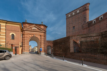 Fossano, Cuneo, Italy: cityscape with view of the Porta di San Martino part of the castle of the...