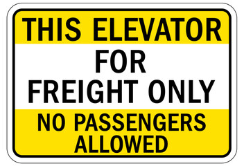 Elevator warning sign and labels this elevator for freight only. No passengers allowed