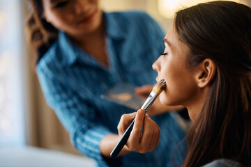 Close up of woman having makeup treatment at beautician's.