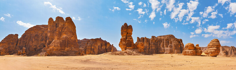 Rocky desert formations with sand in foreground, typical landscape of Al Ula, Saudi Arabia. High...