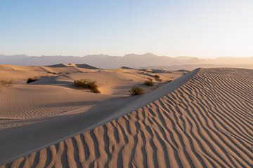 Scenic view on natural ripple sand pattern during sunrise at Mesquite Flat Sand Dunes, Death Valley...