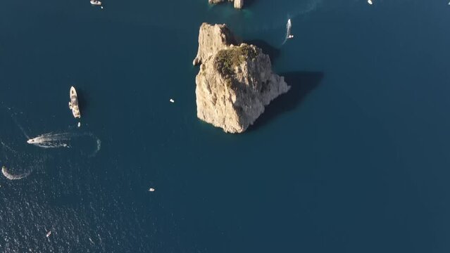 Aerial video of Fraglioni off the coast of Capri, Italy