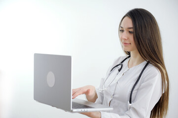 Female doctor and patient woman discussing current health examination while sitting in clinic and using clipboard. Perfect medical service in hospital. Medicine and healthcare concept. High quality