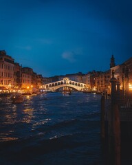 Vertical shot of the Rialto bridge in the evening, Venice, Italy