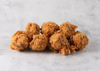 Crispy broasted chicken on a white background