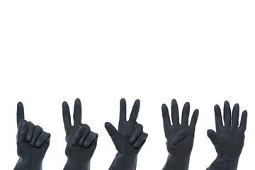 Obraz premium Black rubber gloves counting from one to five on a white background. Hand gestures.