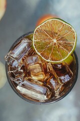 Closeup of an exotic and refreshing cold juice made of fruits served in a glass and with ice in it