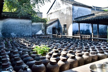 Rice Wine Jars in a courtyard. Wuzhen,  China. 