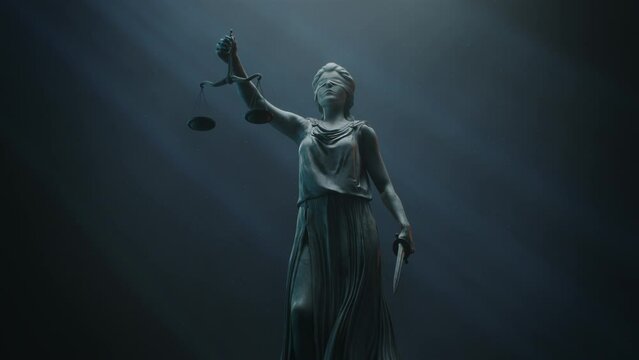 Cinematic and Atmospheric Shot of Lady Justice Sculpture. The Statue is Blindfolded and Holding Scales and Sword.
A Title Sequence for Court Show Mock-up.