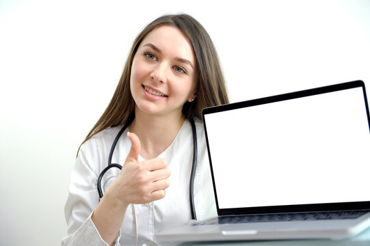 Young woman medical doctor with notebook. High quality photo