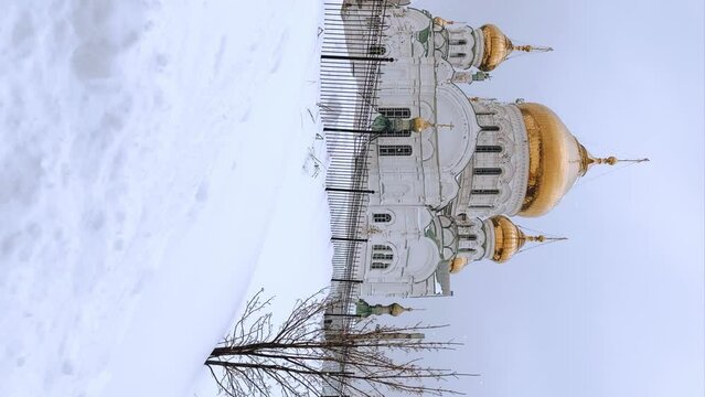 Belogorsky St. Nicholas Orthodox Missionary Monastery. Russia, Perm Krai, Belaya Gora. The temple on the hill in winter. Monastery on the background of snow. 4K