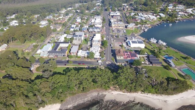 Aerial drone view of Huskisson in the City of Shoalhaven on the shores of Jervis Bay, NSW, Australia, on a bright sunny morning    