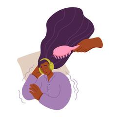 Young woman wearing headphones with closed eyes listens brushing hair sound. Concept of using ASMR content to relax for a restful sleep.