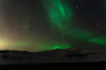 Fototapeta na wymiar aurora borealis northern lights in tromso, norway