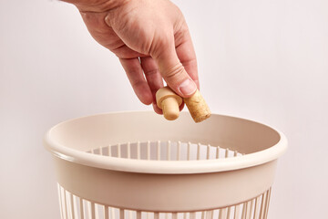 Bottle caps are thrown into the trash. Disposal and recycling of waste.